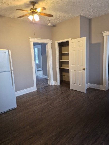 Shared living unit: kitchen and common area with pantry storage