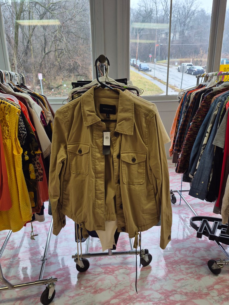 Khaki jacket featured in the community clothing closet