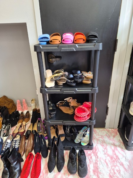 Community clothing closet: racks and donated items